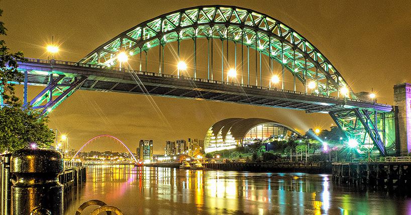 The Tyne bridge and Millennium bridge lit up at dusk